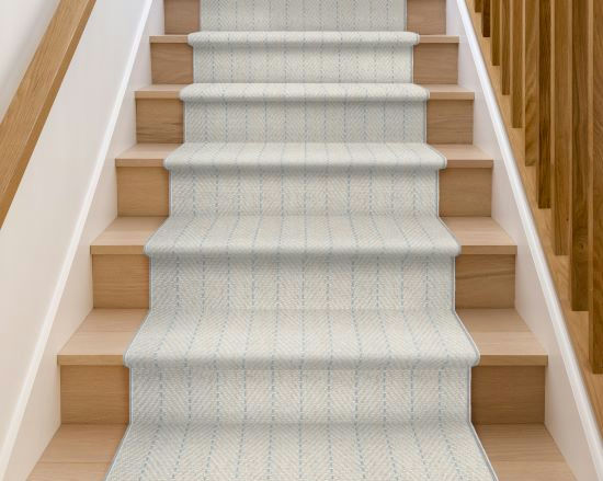 off white carpet stair runner with blue stripes on light hardwood oak.
